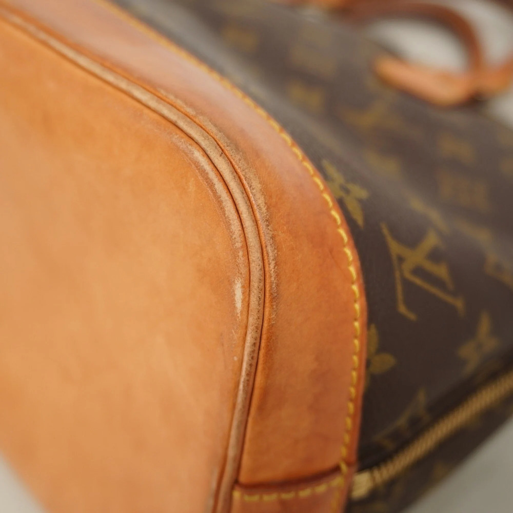 LOUIS VUITTON Brown Monogram Alma Bag - Picture 6 of 9